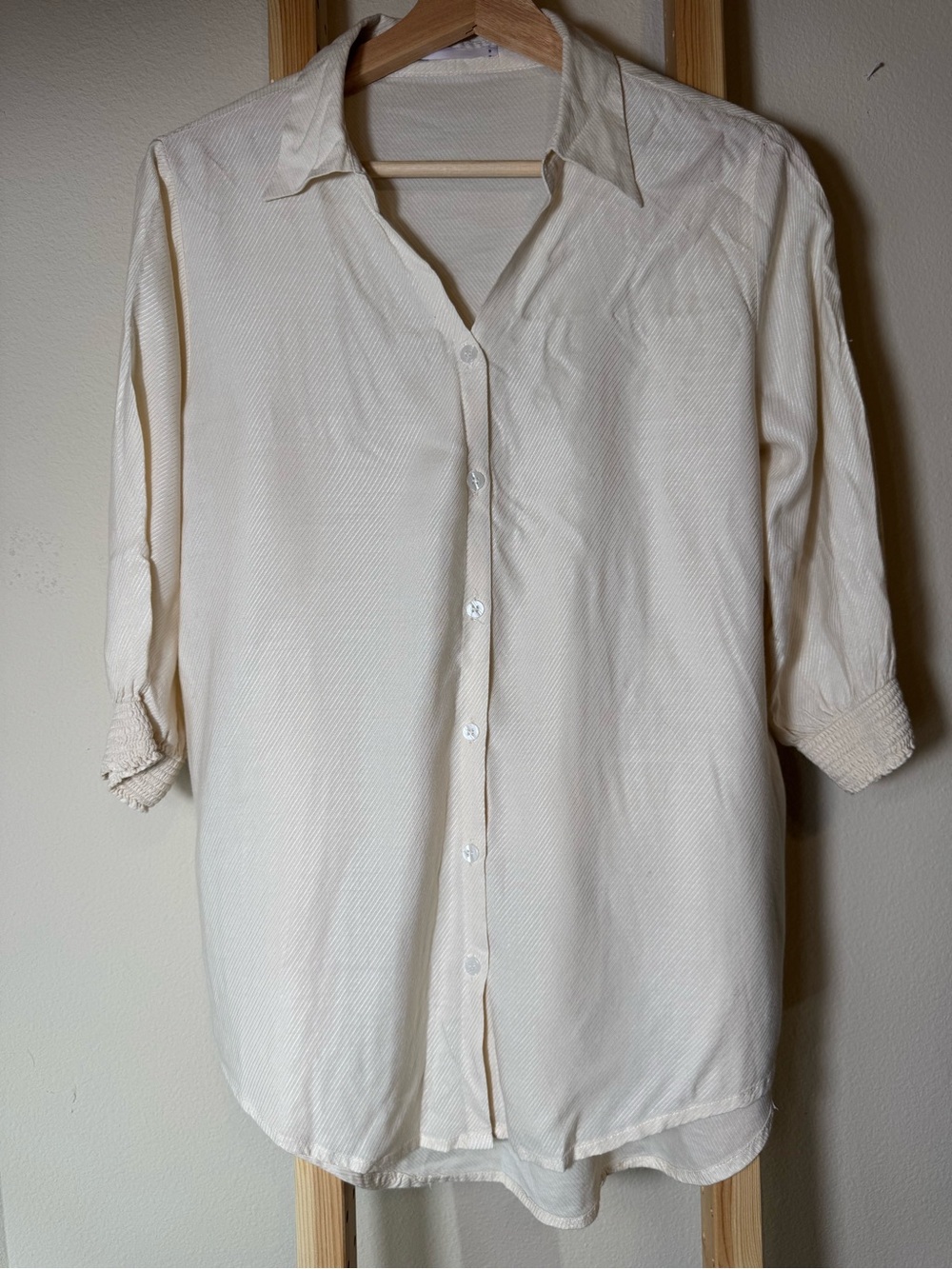Khaadi Cream Smocked
Cuff Button Down
Oversized Cotton Shirt
Blouse